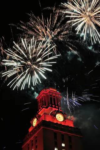 Fireworks light up the tower at University of Texas, Austin.